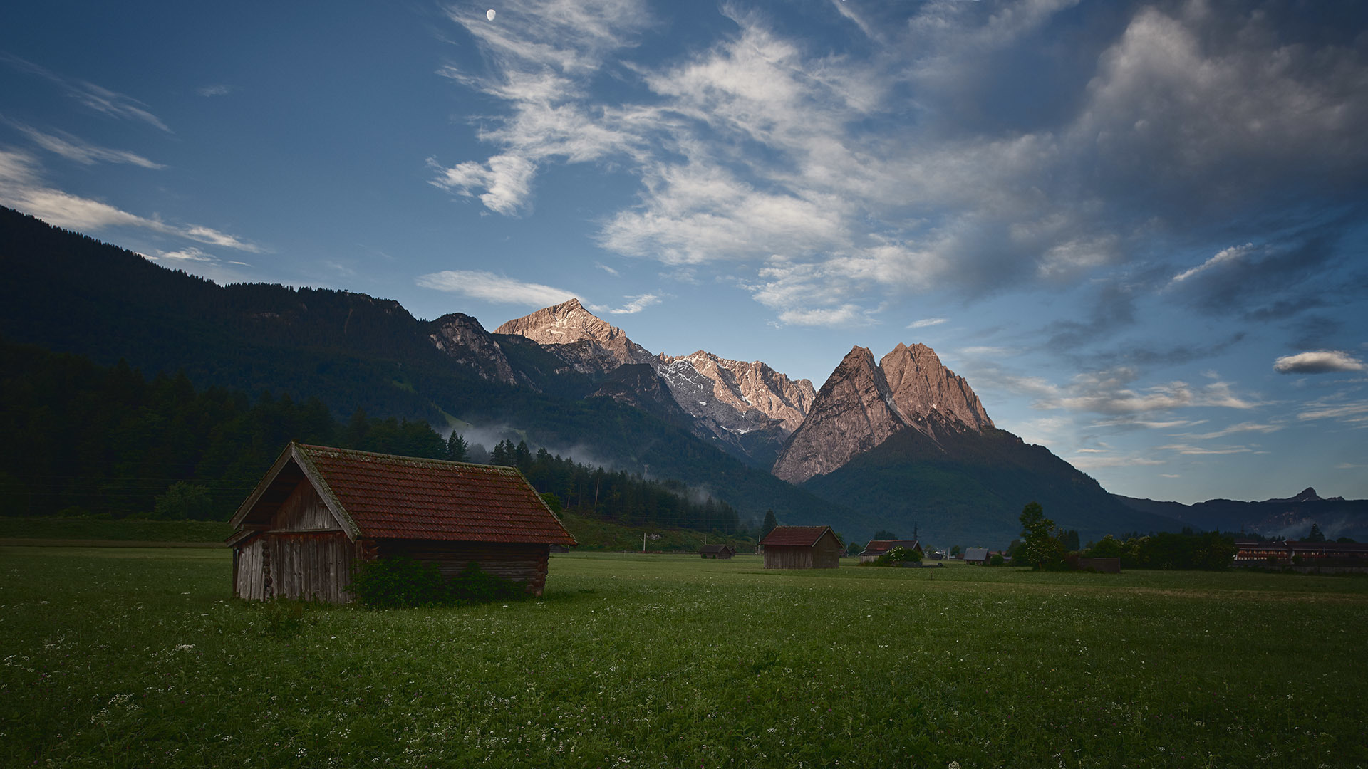 Secluded barns in scenic mountain valley